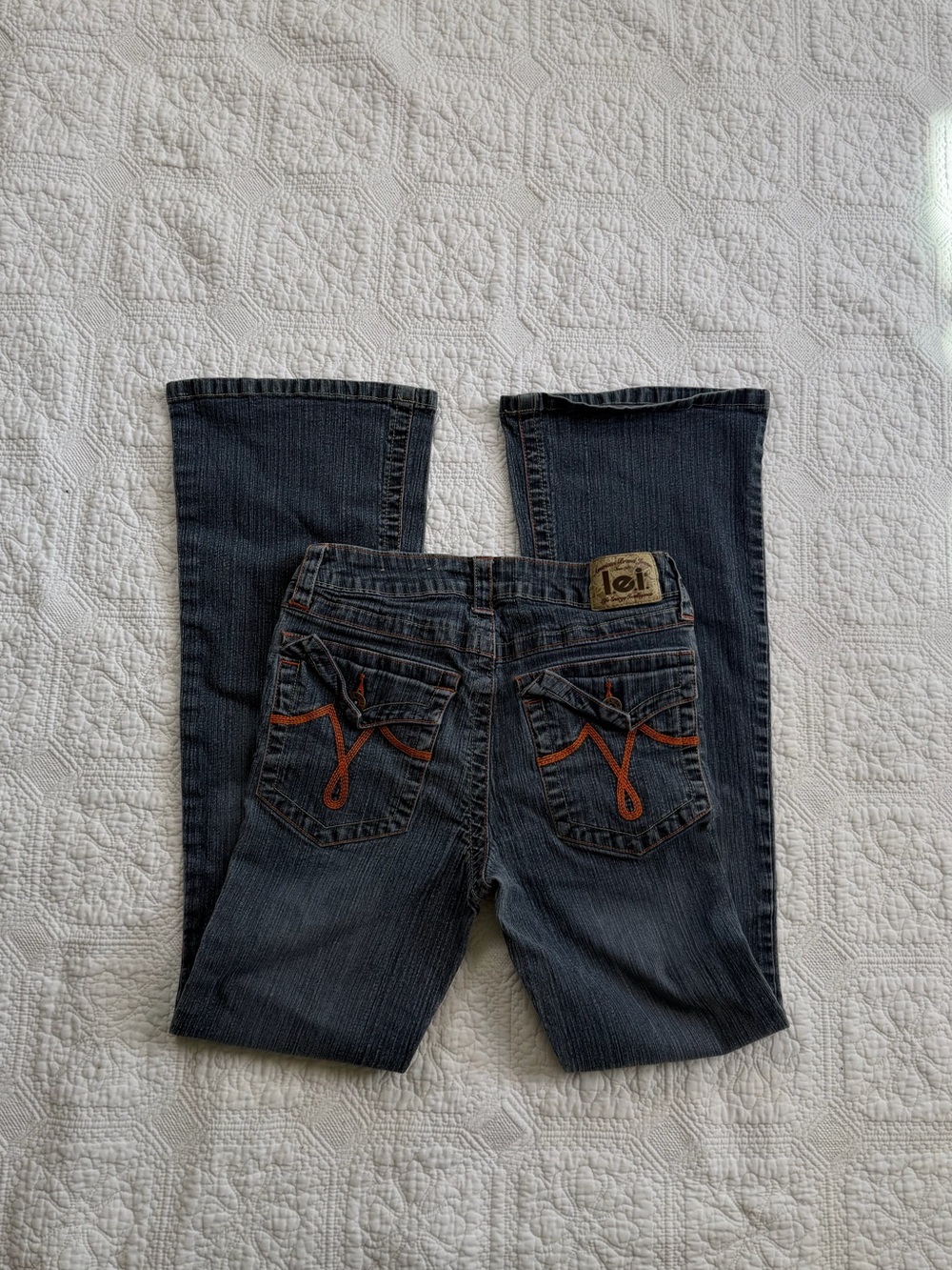 Vintage Y2K flared Lei dark Wash Jeans with Orange Pocket Stitching